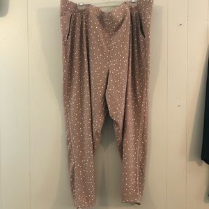 Mauve polka dotted skinny leg trousers from Torrid size 4